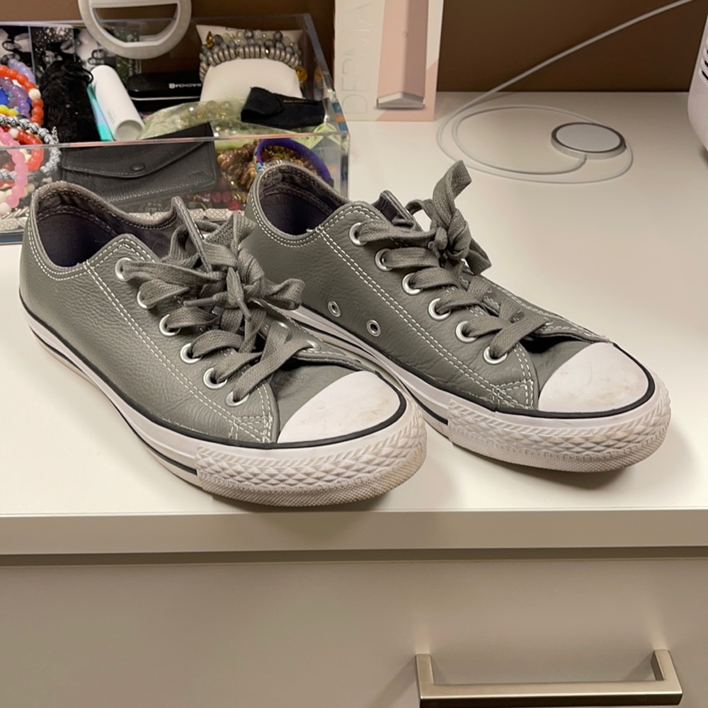 Gently used converse leather shoes.